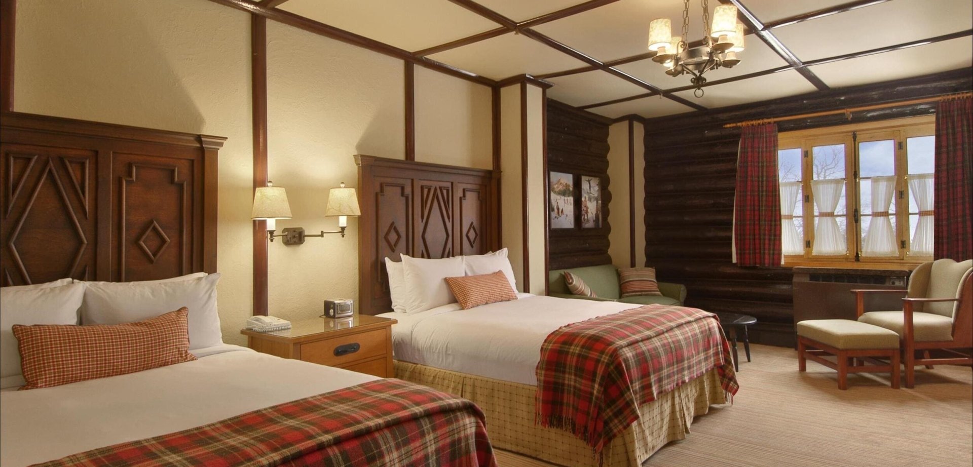 bedroom with two beds and a sitting area