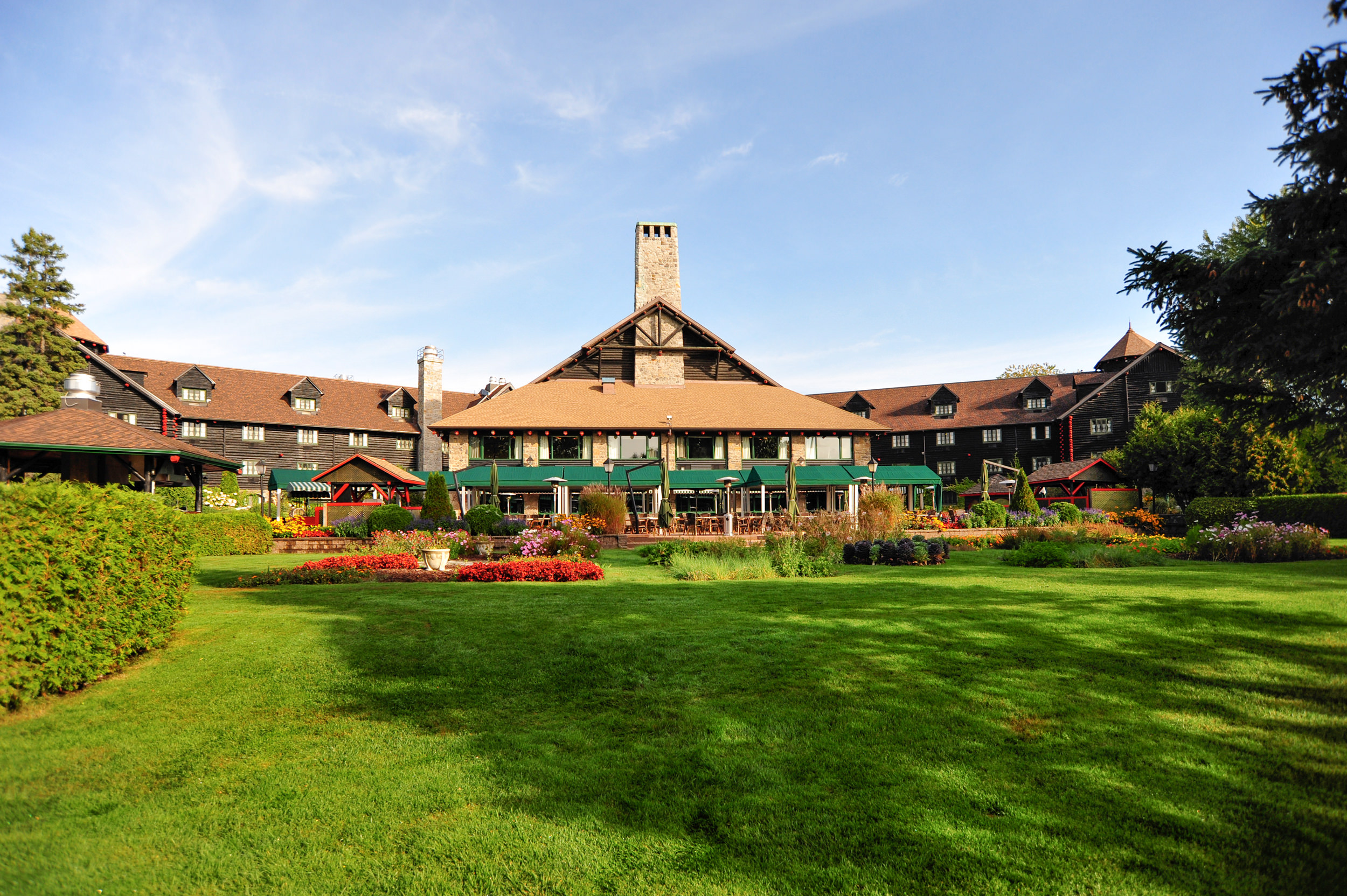 exterior shot of chateau montebello in the spring with flowers in full bloom