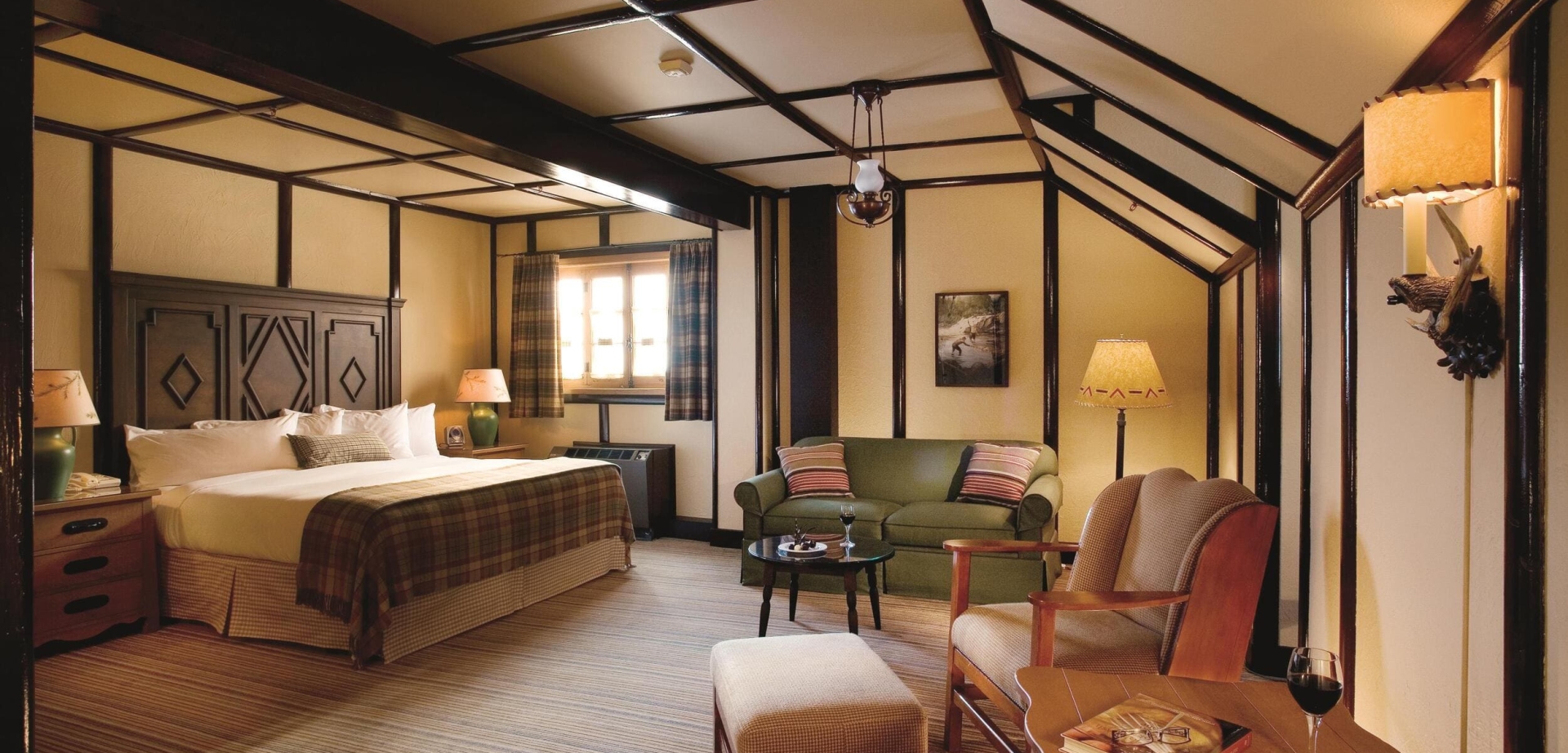 bedroom with loveseat and desk