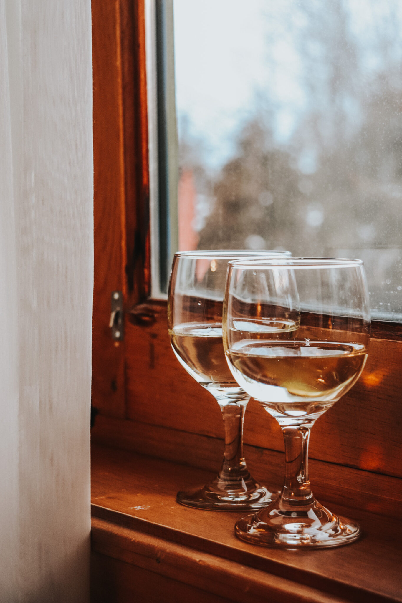 chateau montebello wine glasses window sill winter cozy