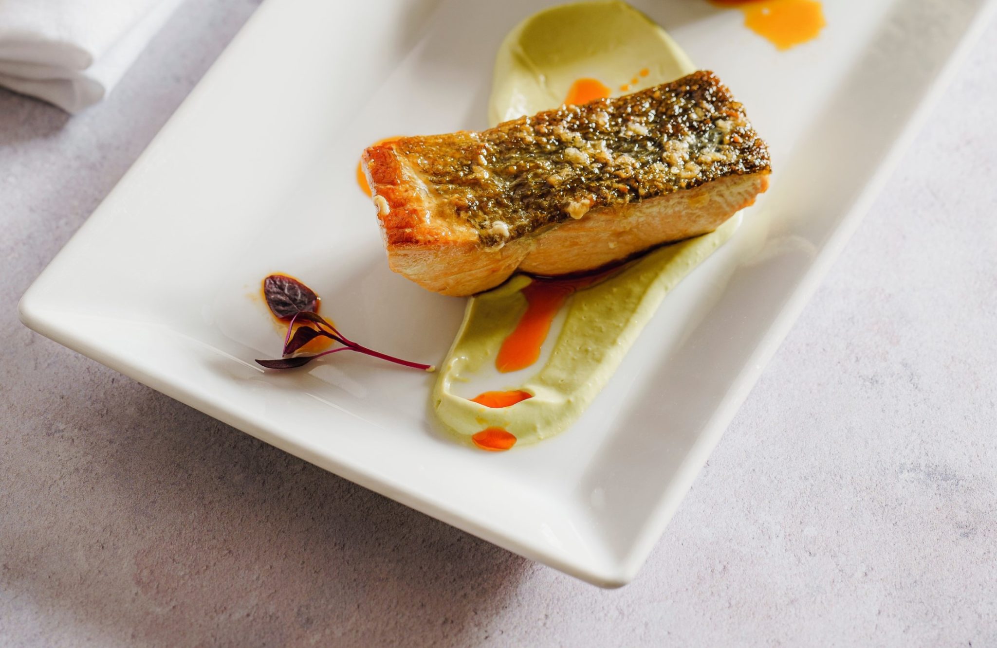 chateau montebello high cousine trout dish served plate sauce