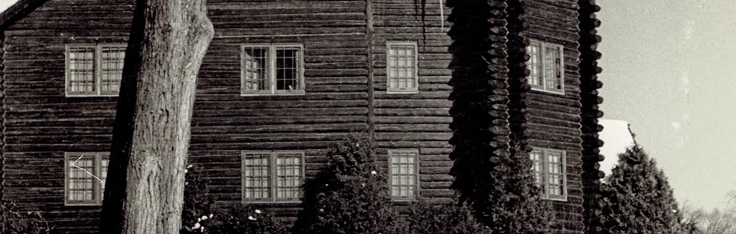 old photo of two people cross country skiing on the fairmont montebello property