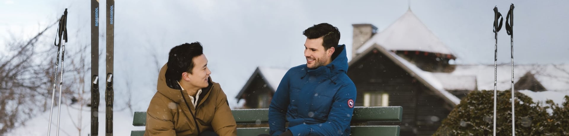 a couple taking a rest after cross country skiing